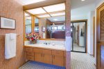 The master bath features double vanities, washer and dryer and a walk-in closet